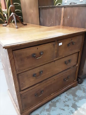 Lot 877 - Edwardian oak chest of two short and two long drawers