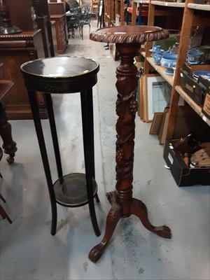 Lot 907 - Victorian style carved mahogany torchere and an ebonised plant stand (2)