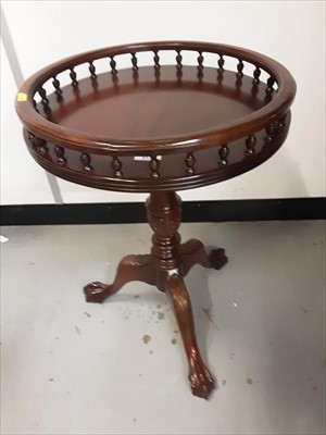 Lot 917 - Georgian style mahogany gallery top wine table on carved tripod base