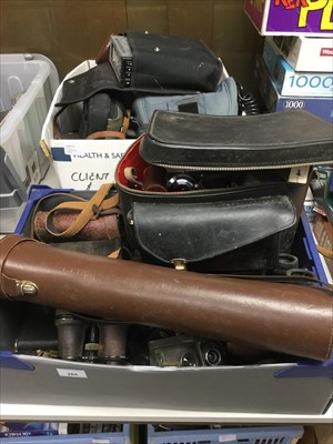 Lot 264 - Two boxes of cameras, binoculars and related accessories
