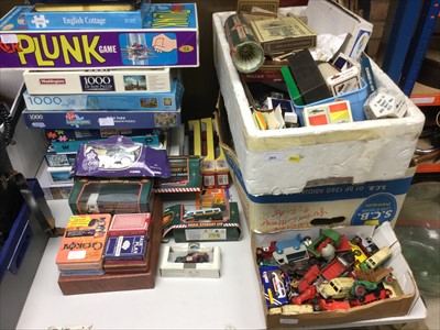 Lot 265 - Group of toys and games to include jigsaw puzzles, model vehicles and trains