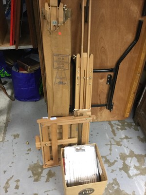 Lot 296 - Three artists easels together with a box of artists equipment