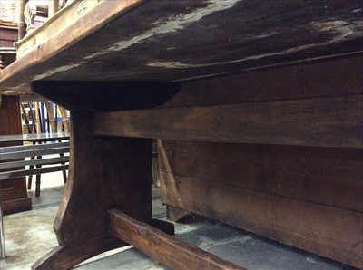 Lot 930 - Rustic refectory table on end standards joined by stretcher
