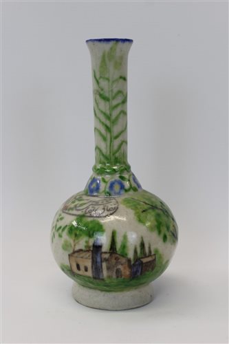 Lot 2066 - Antique Iznik pottery bottle vase decorated...