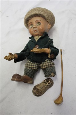Lot 80 - Rare 1920s plaster golfing figure, wearing plus fours and cap