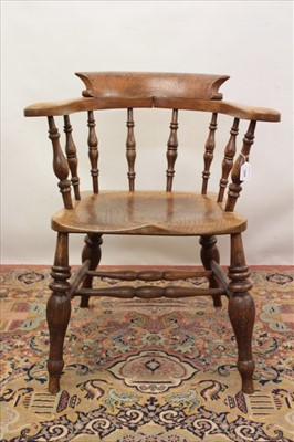 Lot 1269 - 19th century ash elm and beech captains bow armchair