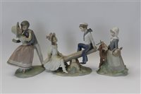 Lot 2076 - Three Lladro porcelain figures - Boy and girl...