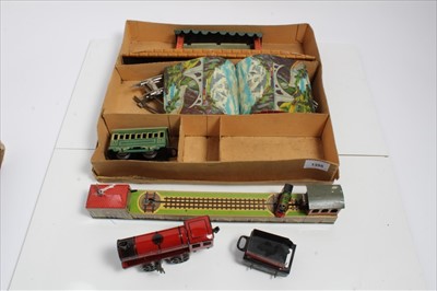 Lot 1355 - Railway tinplate clockwork set in original box plus German tinplate clockwork model of a rotating engine and carriage