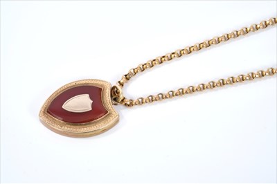 Lot 402 - Victorian shield shaped locket and Victorian gold 9ct chain