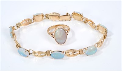 Lot 404 - Gold 14ct opal bracelet and gold 9ct opal ring