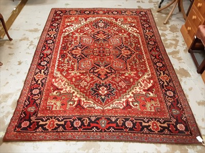 Lot 954 - Large Eastern rug with geometric decoration on red and blue ground