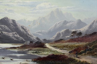 Lot 990 - Charles Leslie 1835 - 1890, an extensive view of Wastwater Cumberland with figures on a track in the foreground, oil on canvas in gilt frame, signed and dated 1880. 30x60cm