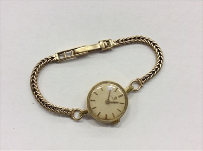 Lot 685 - Omega gold case wristwatch on gold 9ct bracelet