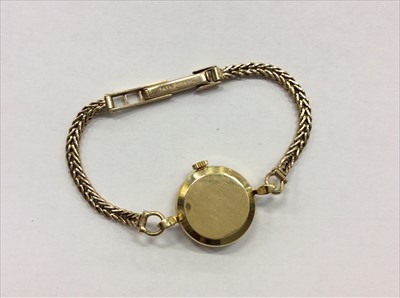 Lot 685 - Omega gold case wristwatch on gold 9ct bracelet