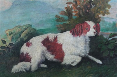 Lot 995 - English School late 19th Century, A naive oil on board of a King Charles Spaniel in a landscape, in gilt frame 33 x 56cm