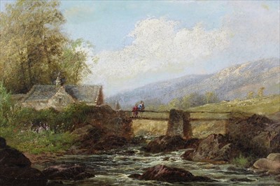 Lot 1023 - English School 19th century, A river landscape with a figure on a bridge by a cottage