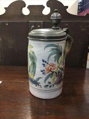 Lot 311 - Antique Delft tankard with polychrome Chinese figure and floral decoration with pewter hinged cover ( replacement handle)