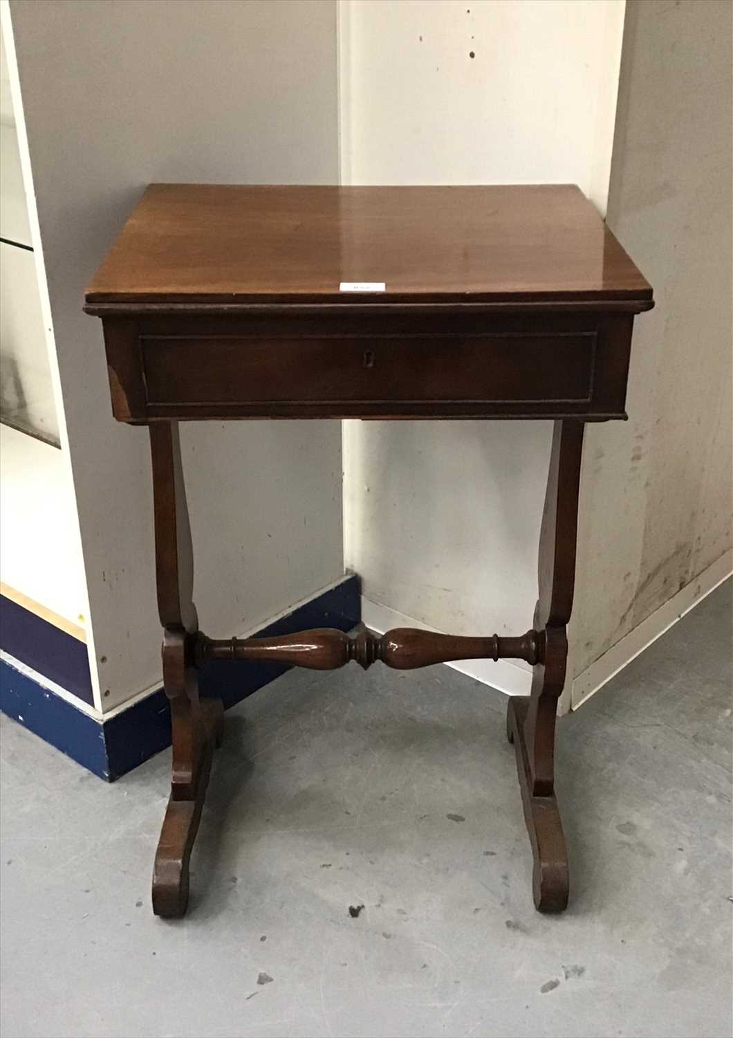 Lot 852 - Early Victorian mahogany sewing table