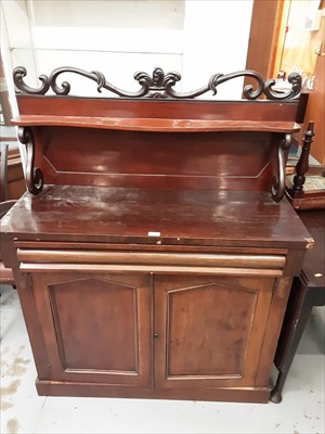 Lot 861 - Victorian mahogany chiffonier with raised ledge back, frieze drawer and two panelled doors below