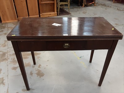 Lot 894 - Georgian mahogany tea table with fold over top on square taper legs