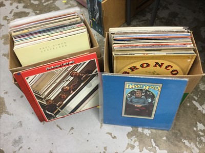 Lot 285 - Two boxes of LP records including The Beatles, The Knock, together with a large quantity of 7" singles