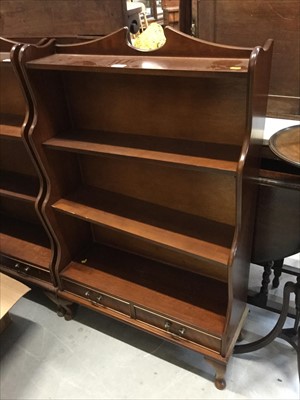 Lot 63 - Pair Georgian -style mahogany waterfall bookcases each with two drawers raised on cabriole legs