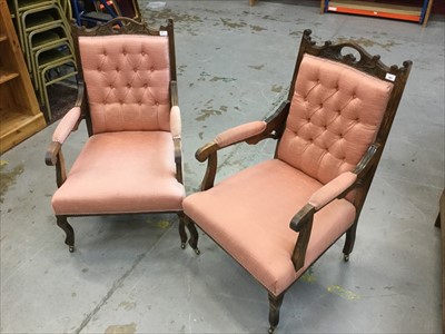 Lot 905 - Pair of Edwardian arm chairs with carved decoration and pink buttoned upholstery