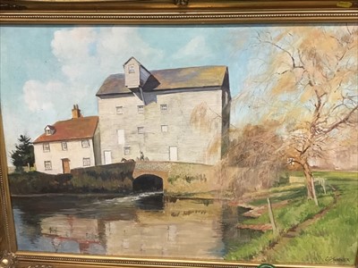 Lot 202 - Charles Clifford Turner watercolour study- Wymondham Abbey, together with oil on board study of an Essex Mill (2)