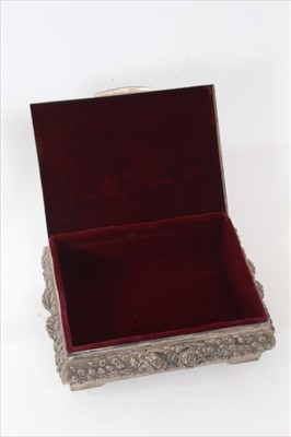 Lot 233 - Eastern white metal casket, two similar frames, a silver spill vase and a silver napkin ring