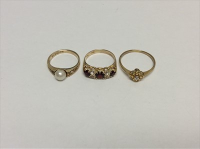 Lot 658 - Gold 9ct cultured pearl ring and two other gold 9ct gem set dress rings (3)