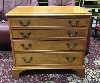 Lot 958 - Small four drawer mahogany chest with swan neck handles on bracket feet