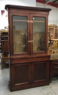 Lot 915 - Victorian mahogany two height book case with pair of glazed doors above frieze draw and two panelled doors