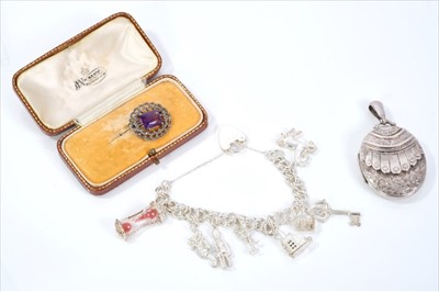 Lot 480 - Amethyst and diamond brooch, silver locket and silver charm bracelet