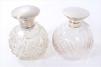 Lot 229 - Two cut glass scent bottles with silver mounts and other items.