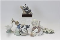 Lot 2141 - Three Lladro porcelain figures - Eskimo with...