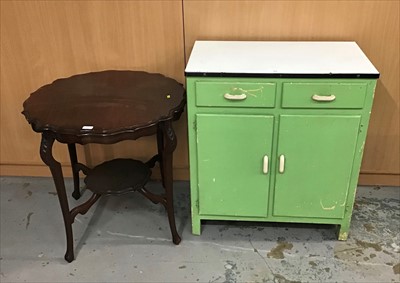 Lot 918 - 1950's enamelled topped kitchen cupboard with two drawers and two doors below together with a two tier mahogany occasional table with shaped top (2)