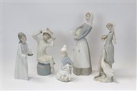 Lot 2142 - Five Lladro porcelain figures - girl with lamb,...