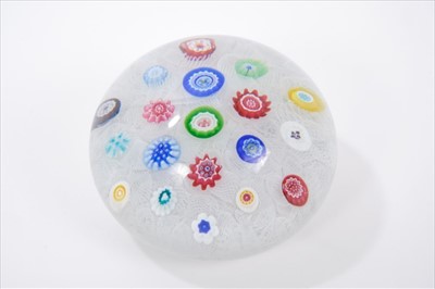 Lot 54 - French Baccarat glass paperweight with scattered millefiori canes on upset muslin ground, dated 1978 - etched marks to base and dated cane, 8cm diameter approximately