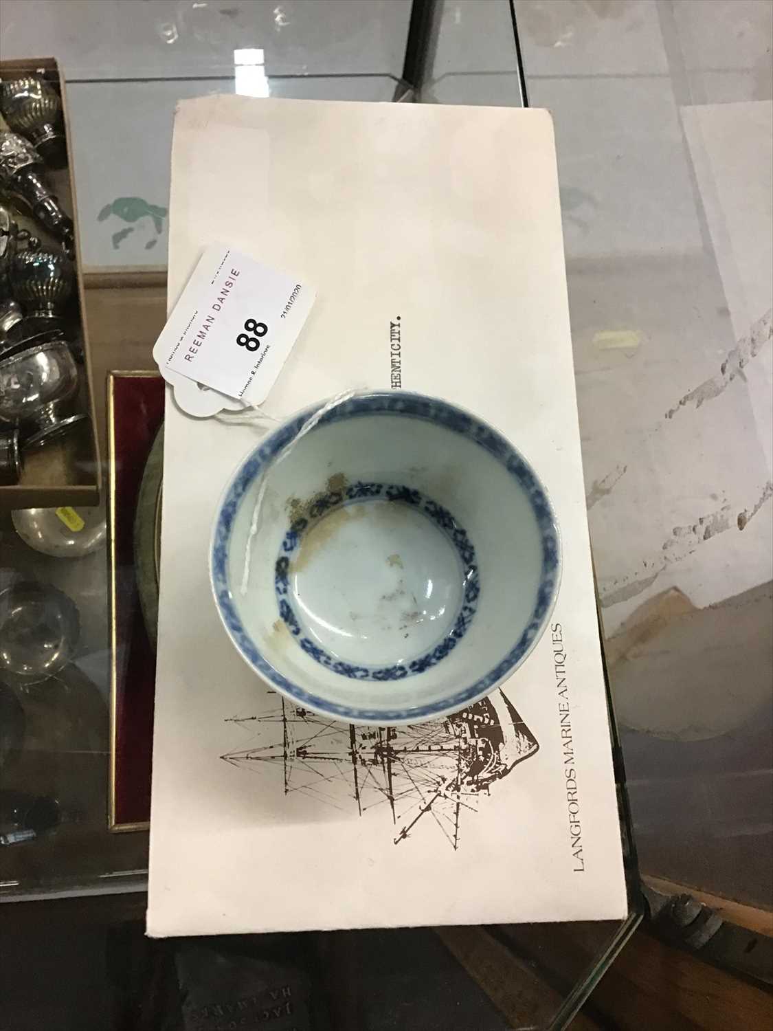Lot 88 - The Nanking Cargo, a mid 18th century blue and white tea bowl -Christie's lot label to base. Sold with certificate
