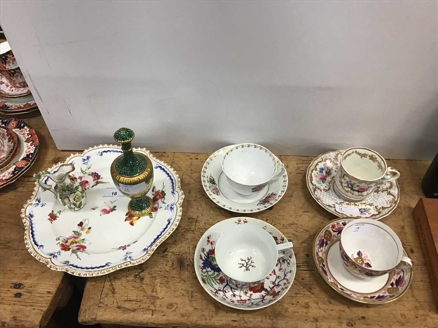 Lot 18 - Collection of 19th century English porcelain teawares - including Derby, Copeland & Garrett and Coalport vase and cover with finely painted landscape reserves (12)