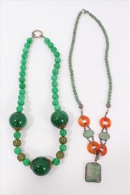 Lot 183 - Chinese green hardstone and carnelian necklace, together with another green hardstone necklace