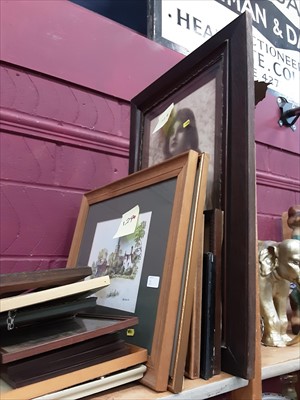 Lot 511 - A box of mixed labelled coat hangers together with picture frames and various prints and pictures