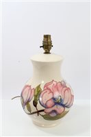 Lot 2154 - Moorcroft pottery table lamp decorated in the...