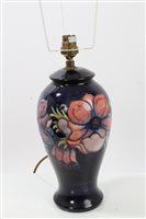 Lot 2155 - Moorcroft pottery table lamp decorated in the...