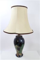 Lot 2156 - Moorcroft pottery table lamp decorated with...