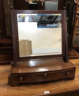 Lot 962 - Regency mahogany bowfront dressing table mirror