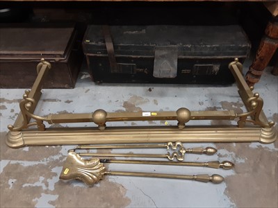 Lot 1000 - Brass fender and fire irons