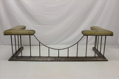 Lot 1282 - Leather upholstered steel club fender