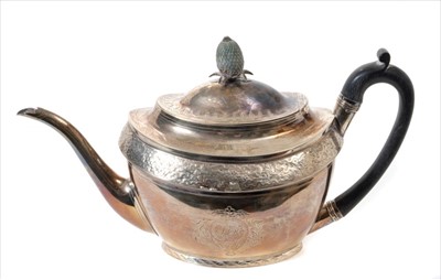 Lot 212 - George III silver teapot of oval form, with foliate engraved border oval
