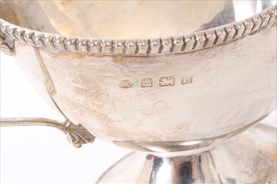 Lot 213 - 1920s silver sauce boat of helmet form